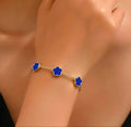 Gold Five Flower Charm Bracelet