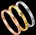 Gold Rhinestone Clover Bangle