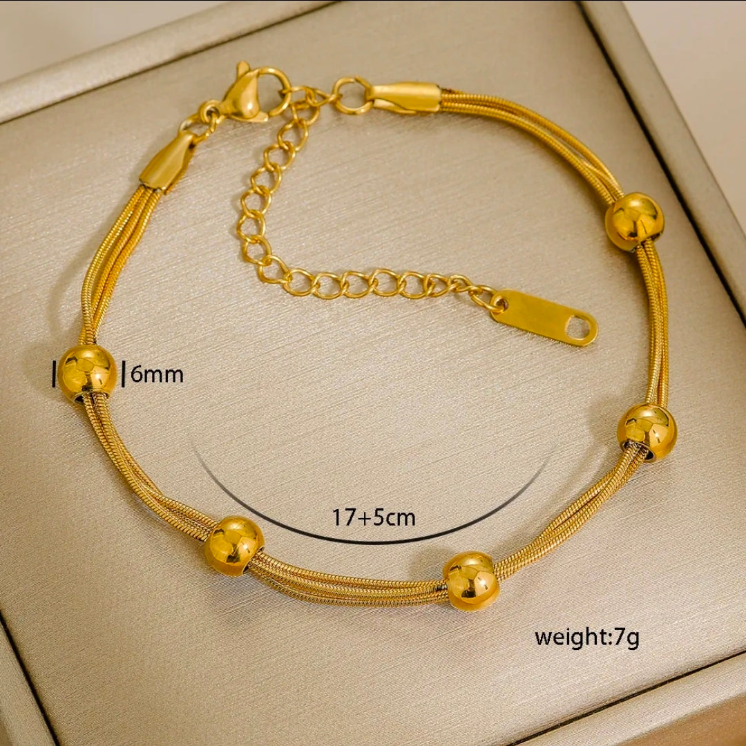 Minimalist Stainless Steel Bracelet 
18K Gold Plated Chain For Women Men 
Unisex Versatile Fashion Jewelry Gift 
Adjustable Snake Rope Cuban Link Style 
Elegant Accessory